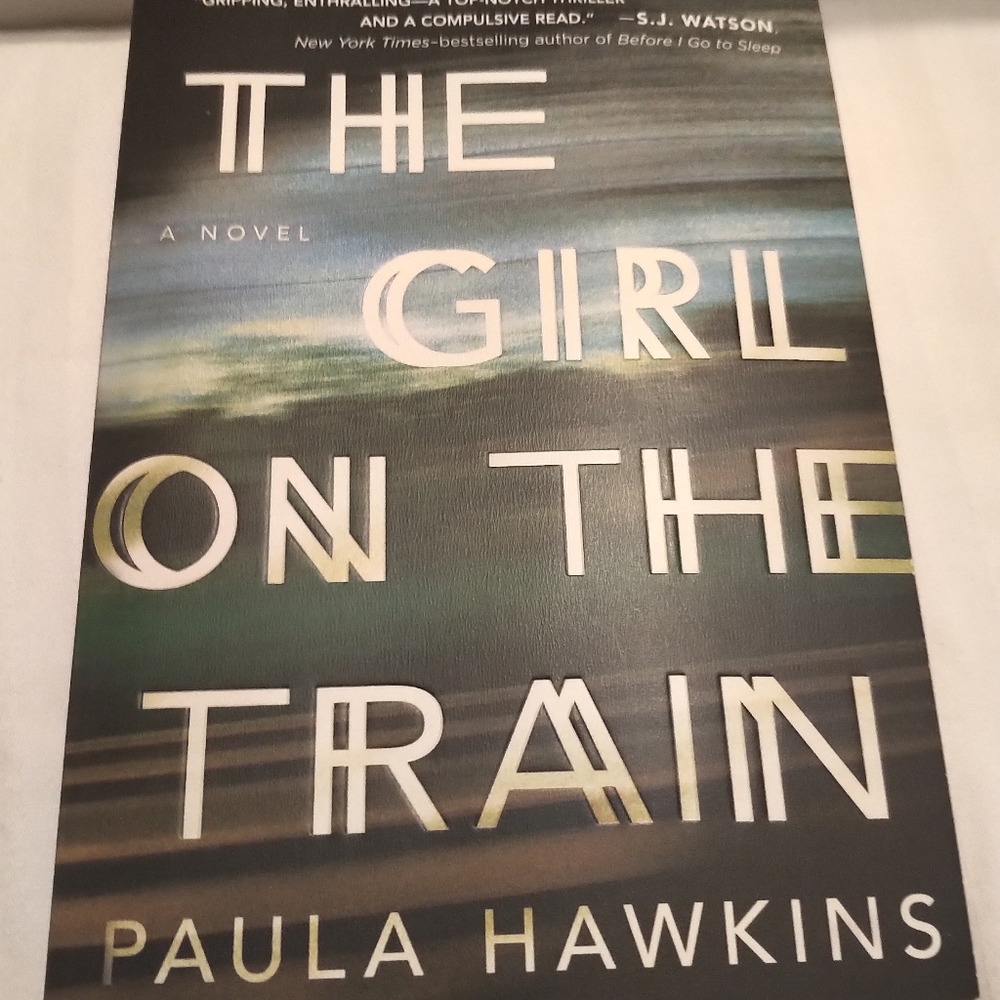BUY 2, GET 1 FREE: The Girl on the Train  by: Paula Hawkin